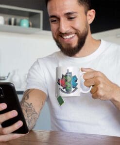 Man drinking tea from EMS custom mug