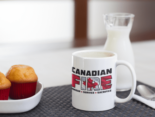 Canadian Fire Coffee Mug beside milk and muffins